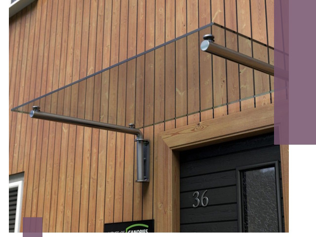 Стеклянные козырьки на входы и фасады в Новодвинске